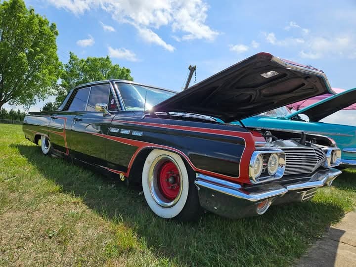 Customer owned classic vehicle featuring Omega Portawalls whitewall tire inserts and authentic vintage styling