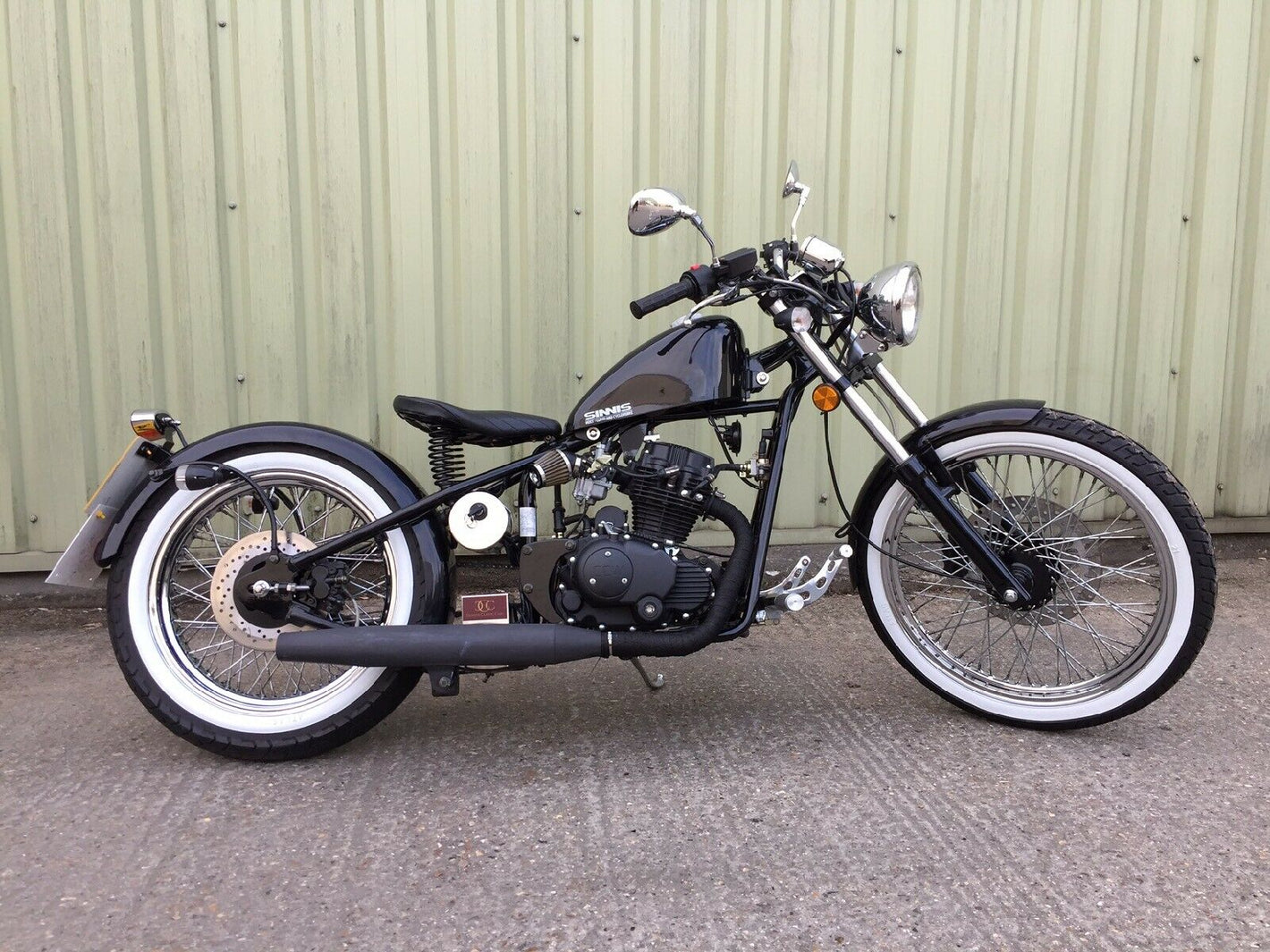 Vintage cruiser vehicle featuring premium whitewall tire inserts and retro styling