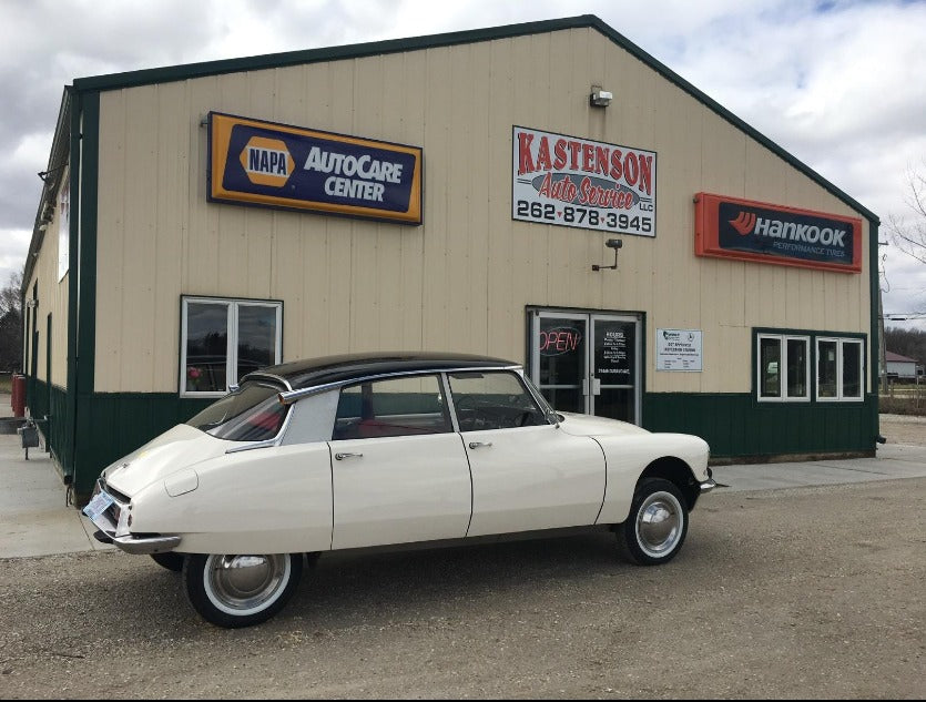 Real customer vehicle showcasing removable whitewall tire inserts and timeless automotive aesthetics