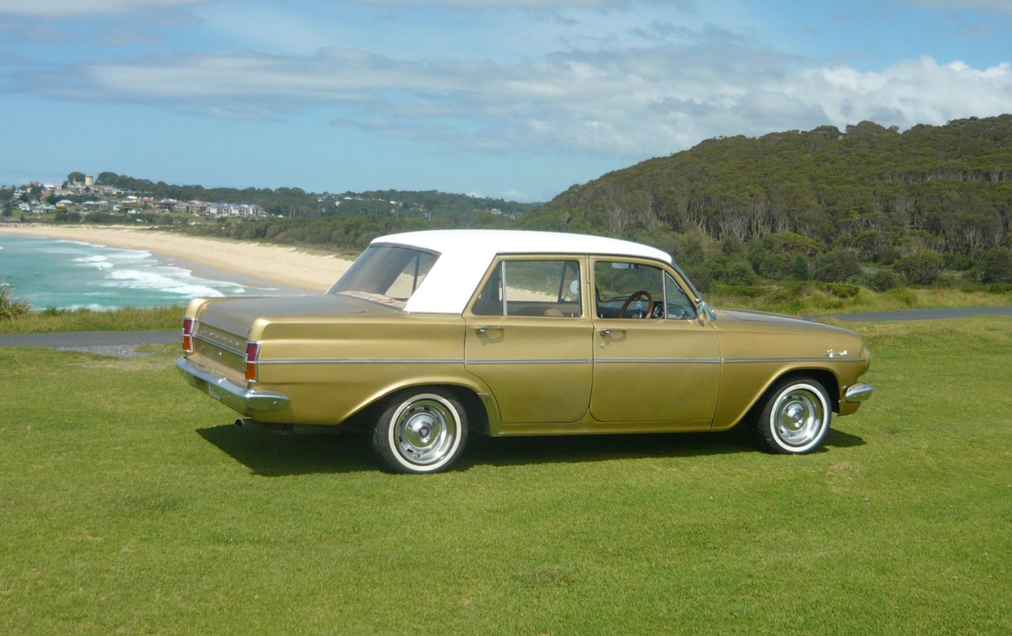 Customer owned vintage automobile enhanced with Omega Portawalls whitewall tire inserts